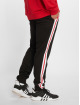 Urban Classics Spodnie do joggingu 3-Tone Side Stripe Terry czarny