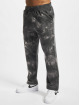 Urban Classics Spodnie do joggingu Tye Dyed czarny