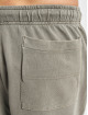 Urban Classics Verryttelyhousut Overdyed harmaa