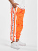 VSCT Clubwear Spodnie do joggingu MC Nylon Striped pomaranczowy